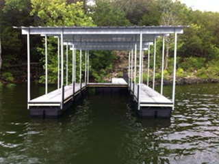 A well-constructed rectangular dock on a lake