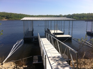 A roofed dock with a durable walkway