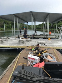 A dock with a roof being completed