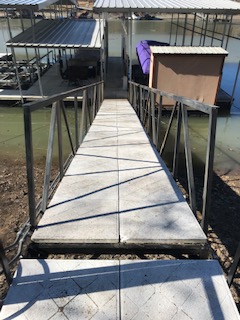 Front view of a walkway leading to a dock